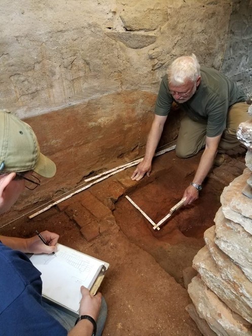 Liberty University archaeologists working inside the cellar at Mead's Tavern.