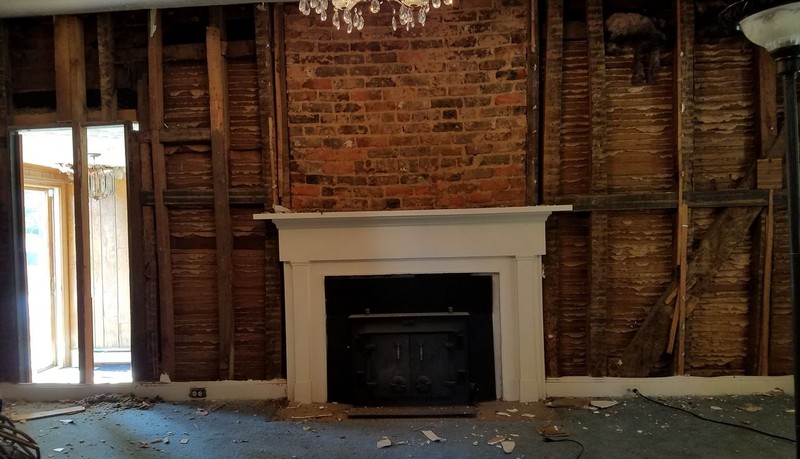 Inside the front parlor of Mead's Tavern after architectural historians removed the modern wall, revealing the orginial framework.