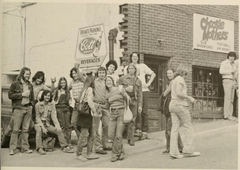 Sunnyside’s restaurants and pubs began catering to student interests, changing the business makeup of the neighborhood. Here, students gather outside a pub in Sunnyside called Choosie Mothers. WVU Monticola, 1978.