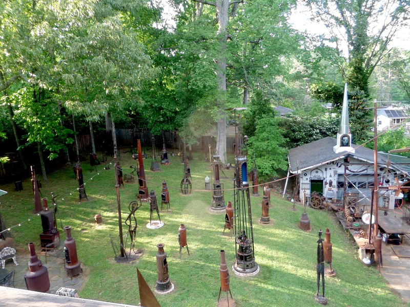 The summit of Druid Hill holds a concentration of inter-related artifacts conceptually related to power structures, i.e., stoves, figures, The B5K ICBM video steeple, etc.