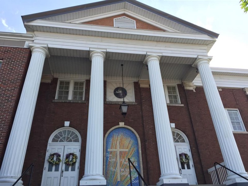 A closer view of the church's neo-classical facade and entryway. Courtesy of First Baptist Church.