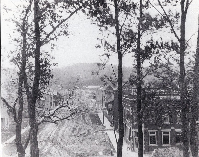 View from the top of the Criel Mound looking southward along unpaved D Street, circa 1920. The Baptist Church would soon be built on the right hand side about two blocks away.