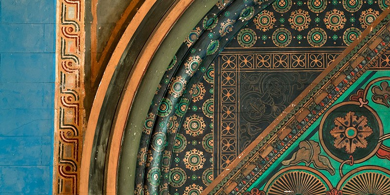 A close-up of the mural behind the church's reading desk.