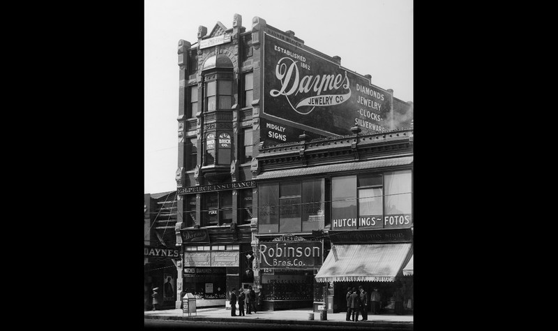 After the 1905 death of patriarch John Daynes and the 1907 robbery of their jewelry store, Daynes' sons pooled their resources together and sold 20,000 shares of their company to purchase Daft Block and relocate to this new location.