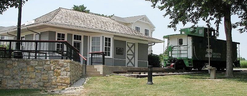The Frisco depot and Northern Pacific caboose