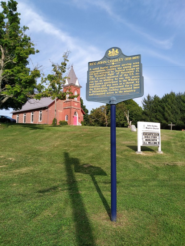 Pennsylvania historic marker, with John Corbly Memorial Baptist Church in the background