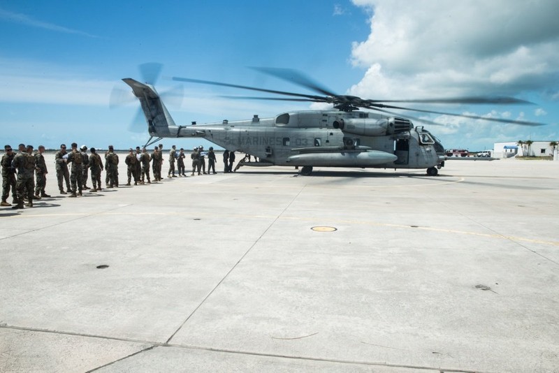 US Marines in a disaster relief effort to delivering supplies to locals after Hurricane Irma.