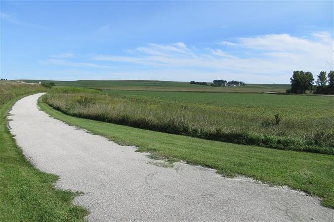  The arch was nominated, and subsequently listed, on the National Register of Historic Places in 1998, as a part of the development and construction of the Rock Island Old Stone Arch Nature Trail, which utilizes the former railbed crossing and travels 4 m