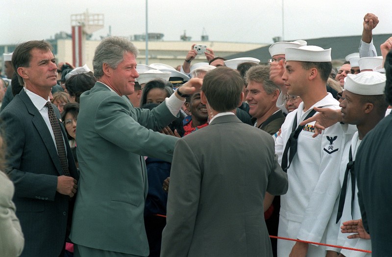 President William J. Clinton greets sailors and personnel at the station in 1993, a few months after the base's imminent closure was announced. The NAS's "disestablishment" was effected in 1997.