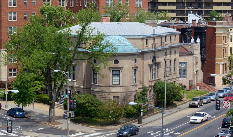 Elevated view of rotunda at southwest corner of building and street intersection.