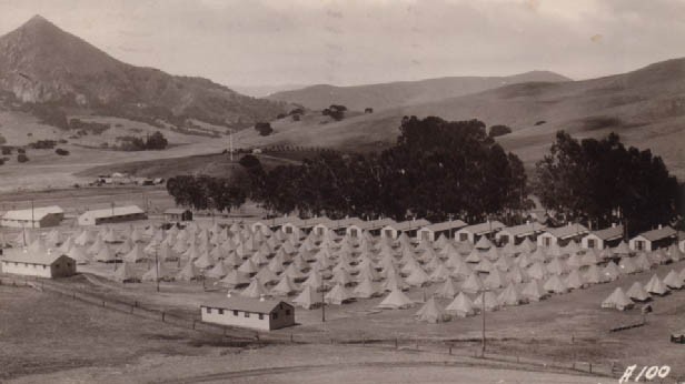 This shows troops that set up tents to camp out in while they are being trained at the camp.