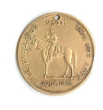 Front of the Excelsior Shoe Medal