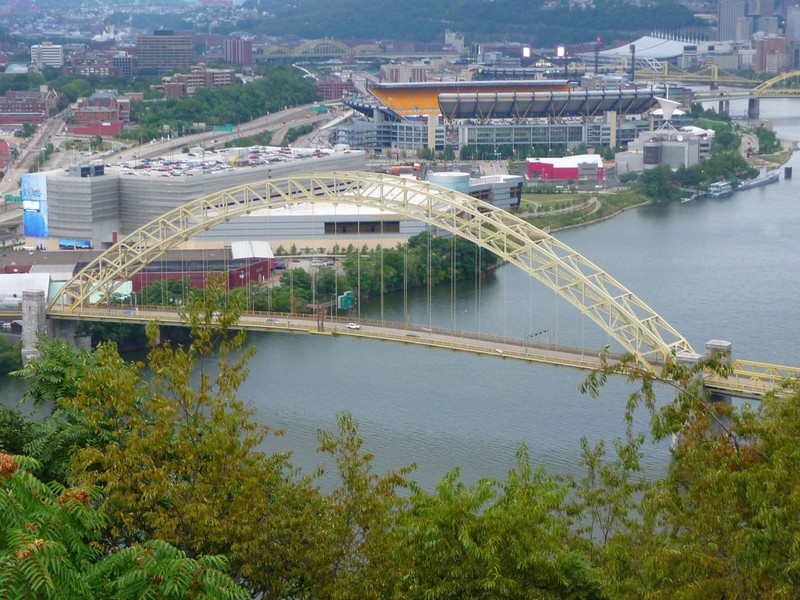 The West End Bridge as seen from Mt. Washington with the Rivers Casino, Carnegie Science Center and Heinz Field in the background.