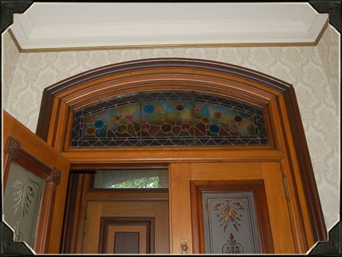 This Victorian style entryway boasts many different types of stained and etched glass.