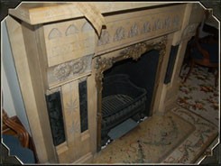 This fireplace, found on the first floor, is crafted from Italian marble.