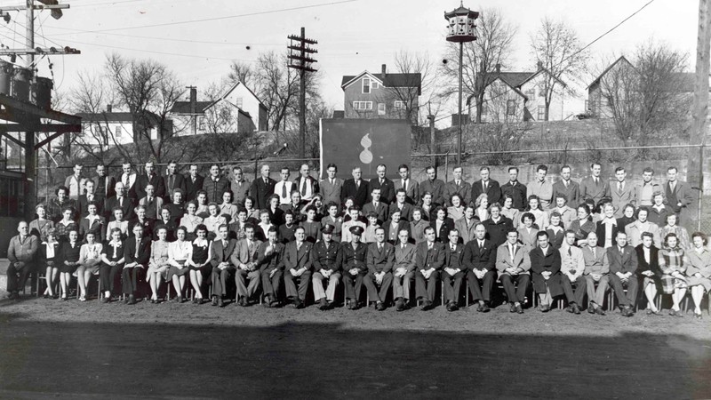 Eau Claire Ordnance plant workers with military officials at "E" award presentation (1943)