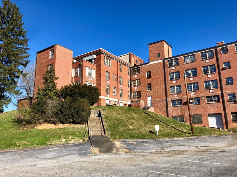 Rear of 1927 building with 1966 additions on the left and 1952 addition on the right