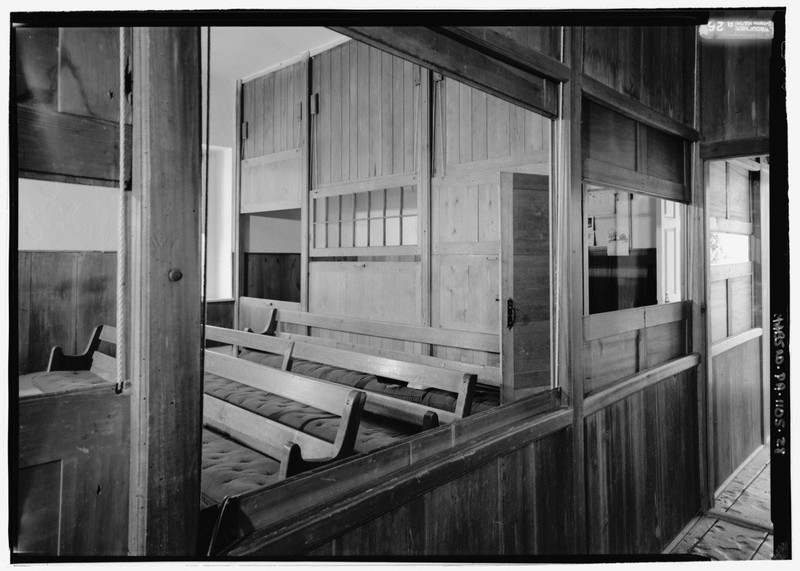 One of the portioned rooms within the meetinghouse. Notice the ropes on the left which are used to move and slide the wooden panels that separate the rooms.