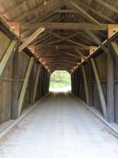 Interior view of the bridge. Note the multiple kingpost trusses on the sides