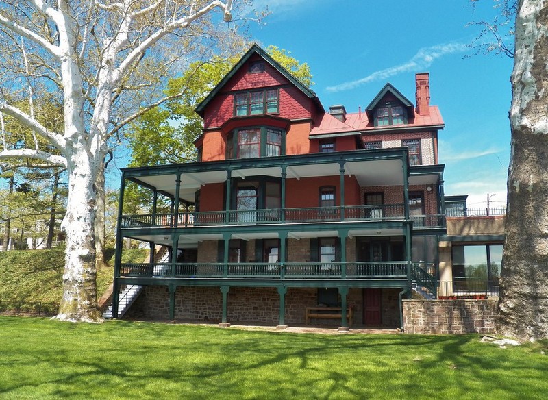 The massive, multi-level porch which was added by the Grundy family, can be seen from the nearby Riverfront Park. 