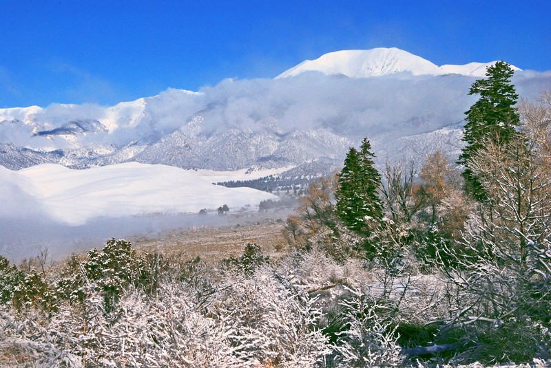 Snow covers Mount Herard in the distance.