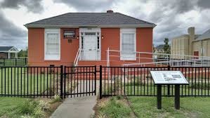 The library at its current location on Elm Street.  The library was moved two times to avoid demolition and serve as a beacon of the Colored Community. 