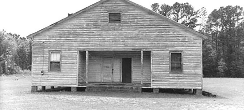 Photo of the front of the school, taken before any renovations