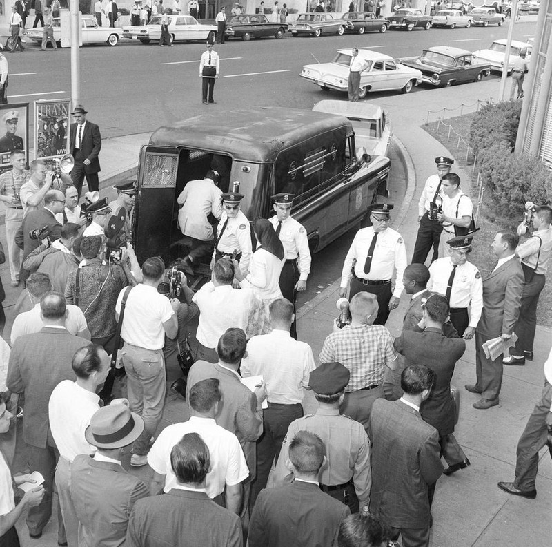 Fifteen Freedom Riders that arrived on a second bus in Jackson, Miss., are loaded into a paddy wagon at the bus station, May 24, 1961. They entered the "whites only" waiting room and were arrested for being in violation of state laws. 