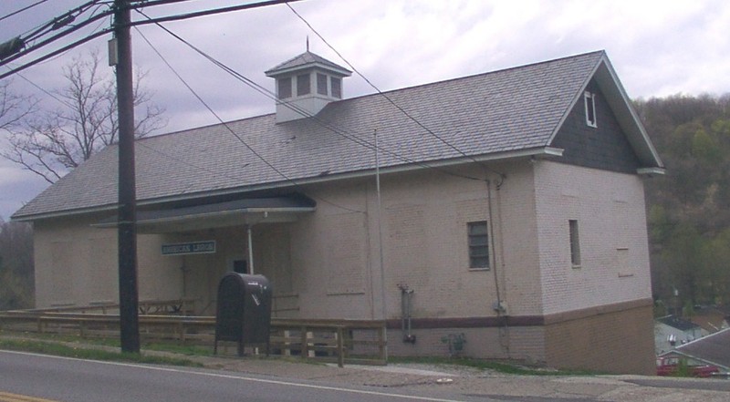 Carter G. Woodson School. / American Legion Hall today