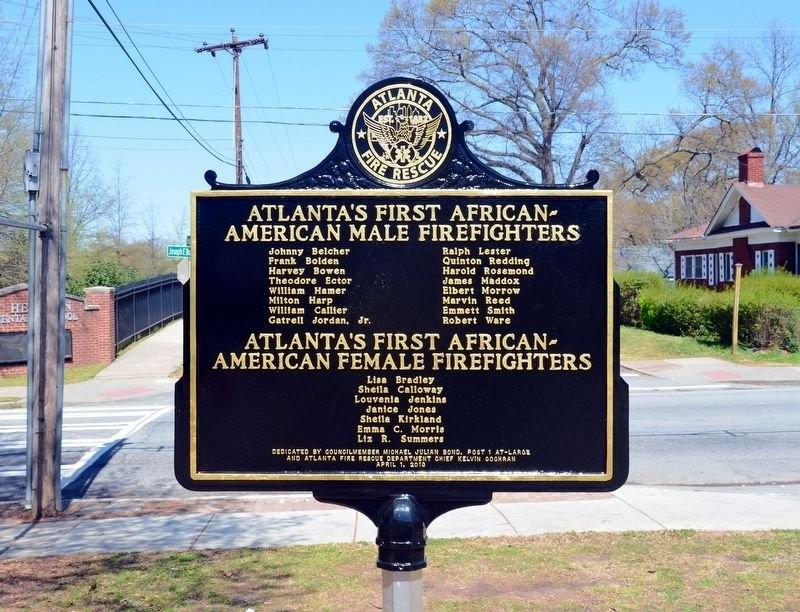 The second side of the marker. It lists the names of the first male and female firefighters that served Fire Station 16.There were 16 males were hired in 1962  and the 7 females were hired in 1977.