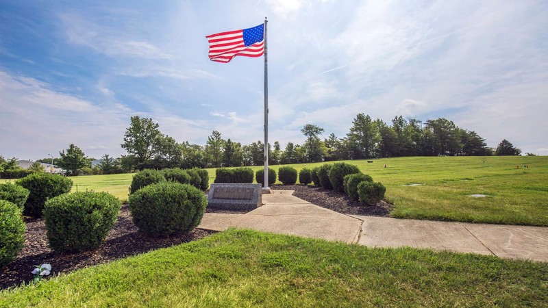 The American Flag ripples in the wind in this area of the park.