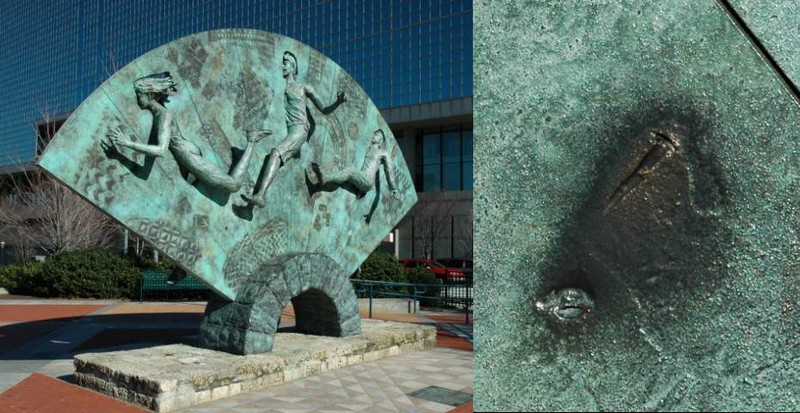 This is one of the many sculptures located in the park. It was located near the site of the bombing, as evidenced by the imprint of a screw in the closeup shot on the right side of the picture.