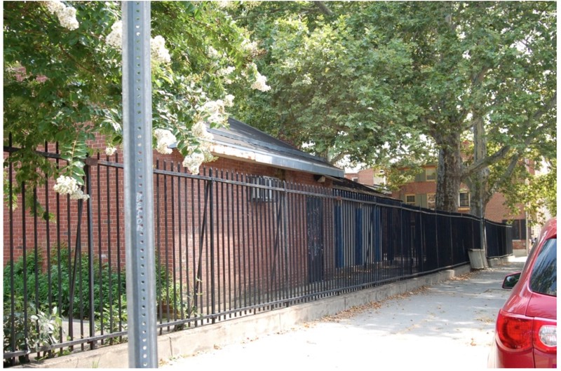 Closeup photograph of the iron fence, constructed circa 1924