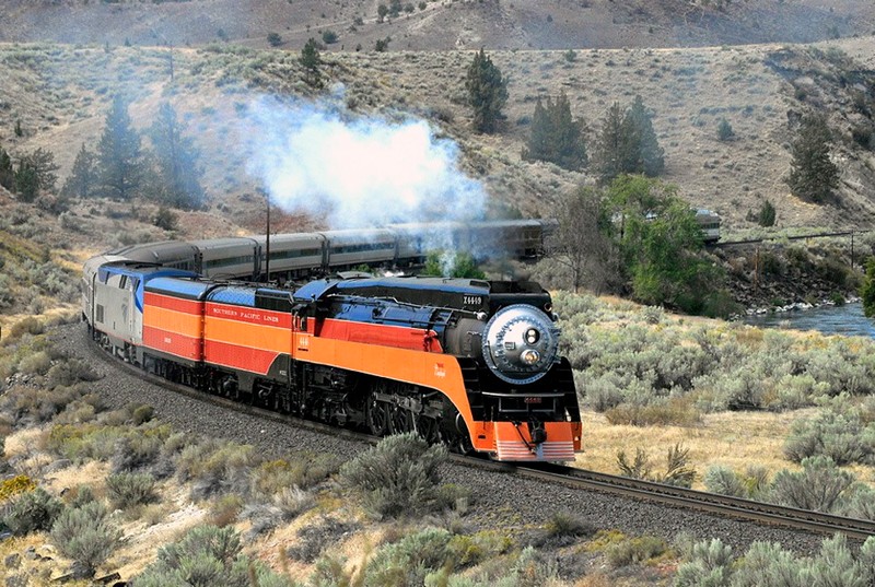 The Southern Pacific 4449 locomotive, seen here pulling passenger cars, and the Spokane, Portland & Seattle 200 are operable.