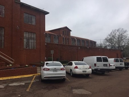 North-side wall with West building cell block in background