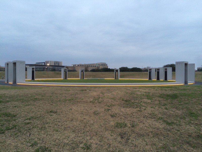 This is the Spirit Ring that consists of the 12 portals dedicated to the deceased students. The portals point in the direction of the students' home towns. The 27 bronze plaques to honor the injured are in between these portals.