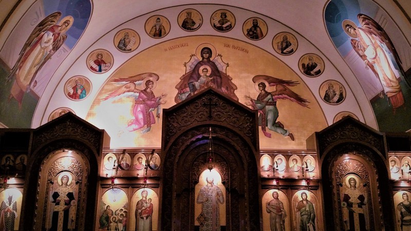 The altar, replete with depictions of the saints, including the twelve disciples and the Virgin Mary.