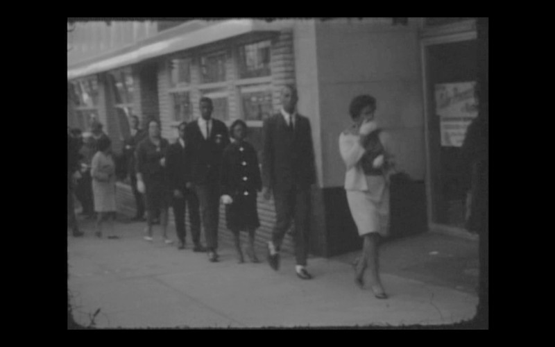 The picketing taking place outside of Bailey's on May 1, 1963.