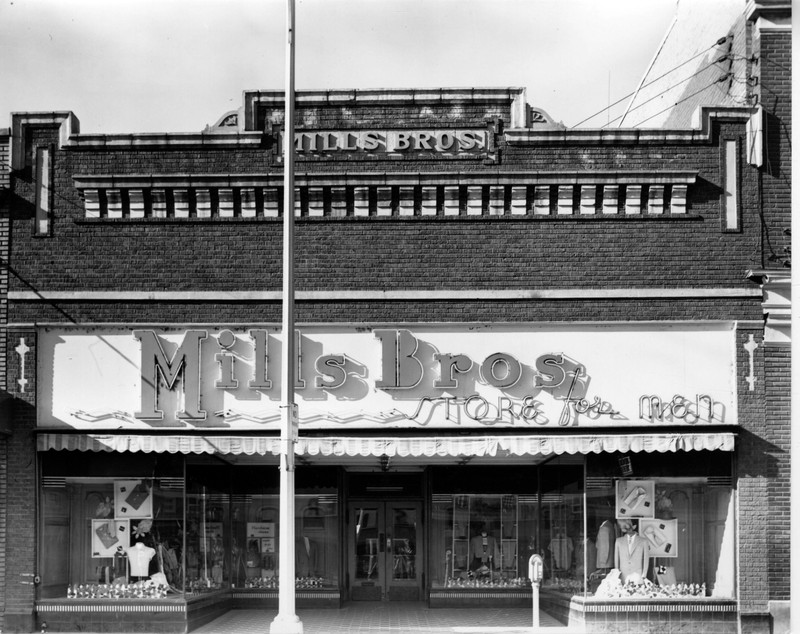 An early photograph of the Mills Brothers Storefront