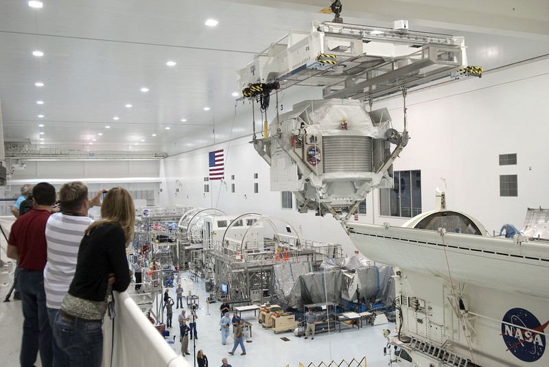 KSC's Space Station Processing Facility prepares a spectrometer, an instrument for the International Space Station to conduct experiments. Courtesy of NASA, 2011.