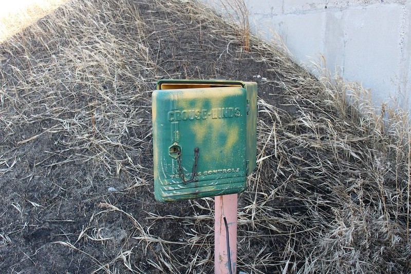 Believed to be a communication box to talk with personnel inside the warhead building.