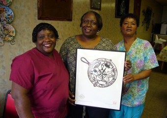 Here are some of the women of Wilson's Soul Food Inc., including Angelish Wilson (center), daughter of M.C. Wilson, who helped to maintain the home-style eatery for 30 years.  