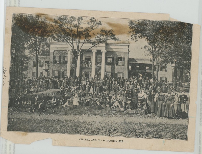 Students gathered in front of Reynolds Hall in 1897, not long after the school, then known as Alabama Girls' Industrial School, first opened.