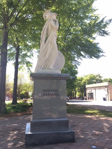 North side view of Athena and her cloak; inscribed on the base are the words "Wisdom" and "Learning"