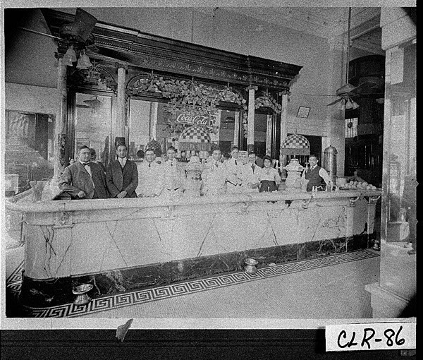 Photograph of Costa family at opening of their soda fountain in the Southern Mutual Building in 1908, photo courtesy of the "Vanishing Georgia" collection, Georgia Archives.