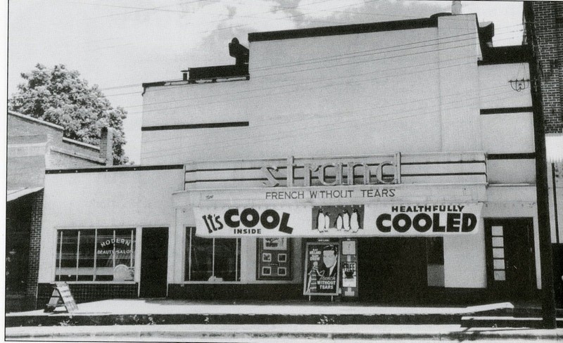 The Strand in 1940. During segregation, African American patrons had to use the long outside stairs to the balcony. 