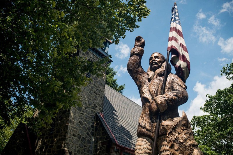 A statue in the front yard depicts famed African American explorer Matthew Henson, who journeyed on several expeditions to the North Pole with Robert Peary. Image obtained from the Philadelphia Inquirer.