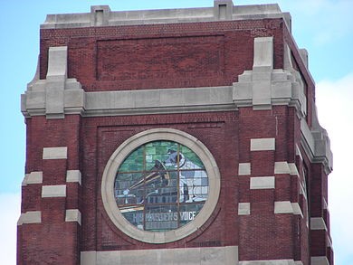 Stained glass window in the building's tower featuring Nipper listening to the radio. This was an adaptation of a 1901 painting called "His Master's Voice"