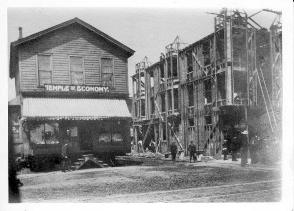 The Temple of Economy occupied the northeast corner of E. Main Street and Mechanic Avenue. The store's building was moved into the middle of Mechanic Avenue while the Shafer Block was built in 1899. The store would then relocate into the new building. The Owl Grill later occupied this building.