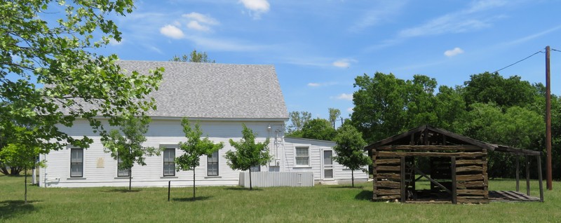 The church and the log cabin. 